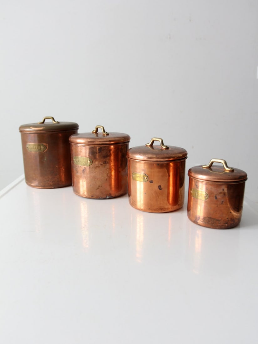 Vintage Copper Kitchen Canister Set 4 with Brass Handles: Vintage Copper Kitchen Canister Set 4 with Brass Handles Enhance your kitchen's decor with this vintage copper canister set, featuring four charming containers that embody timeless elegance. Each cani
