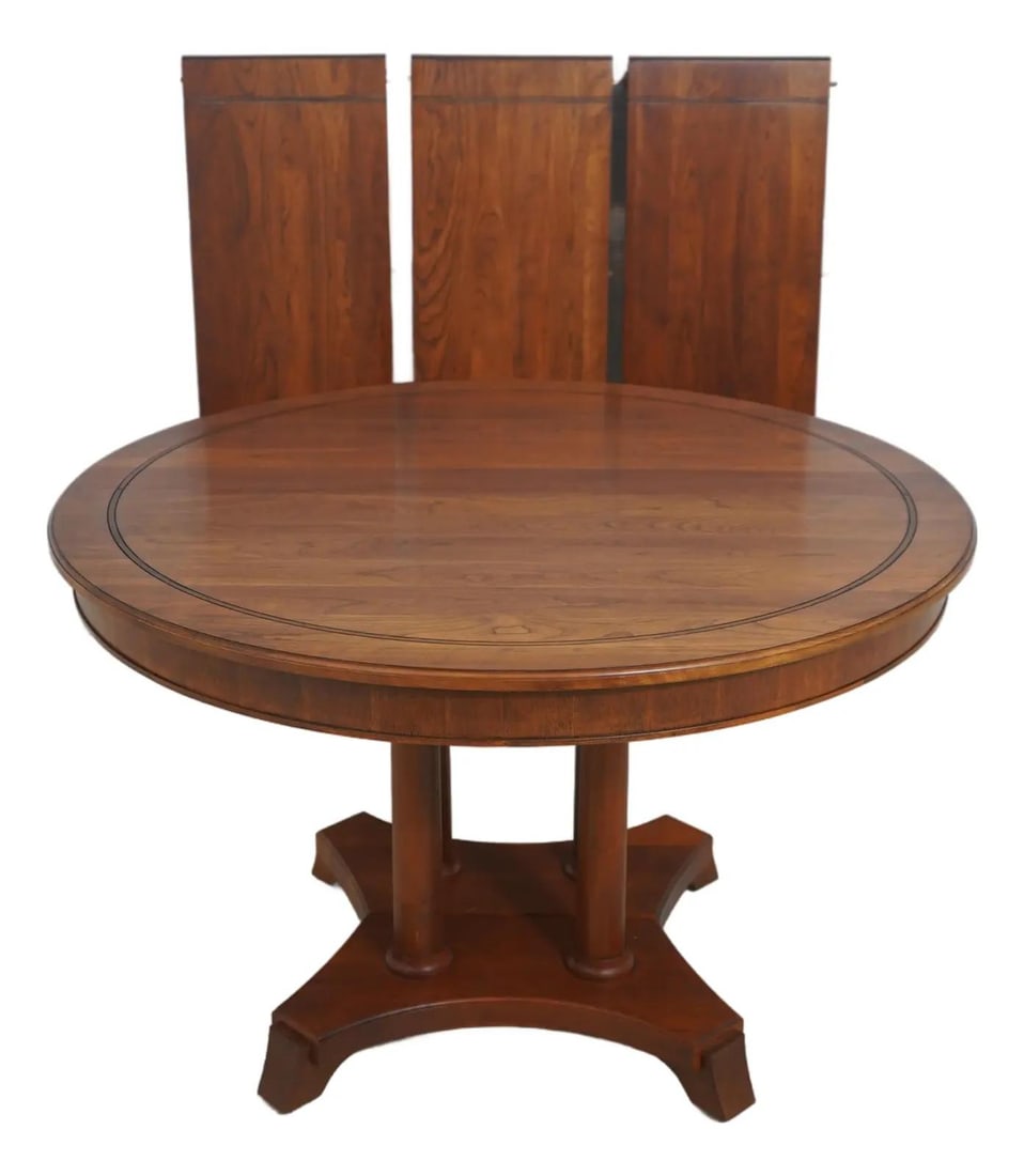 Stickley French Empire Round Cherry Dining Table with Split Pedestal: Stickley French Empire Round Cherry Dining Table with Split Pedestal This exquisite Stickley French Empire Style Round Dining Room Table showcases a harmonious blend of elegance and functionality. Cra
