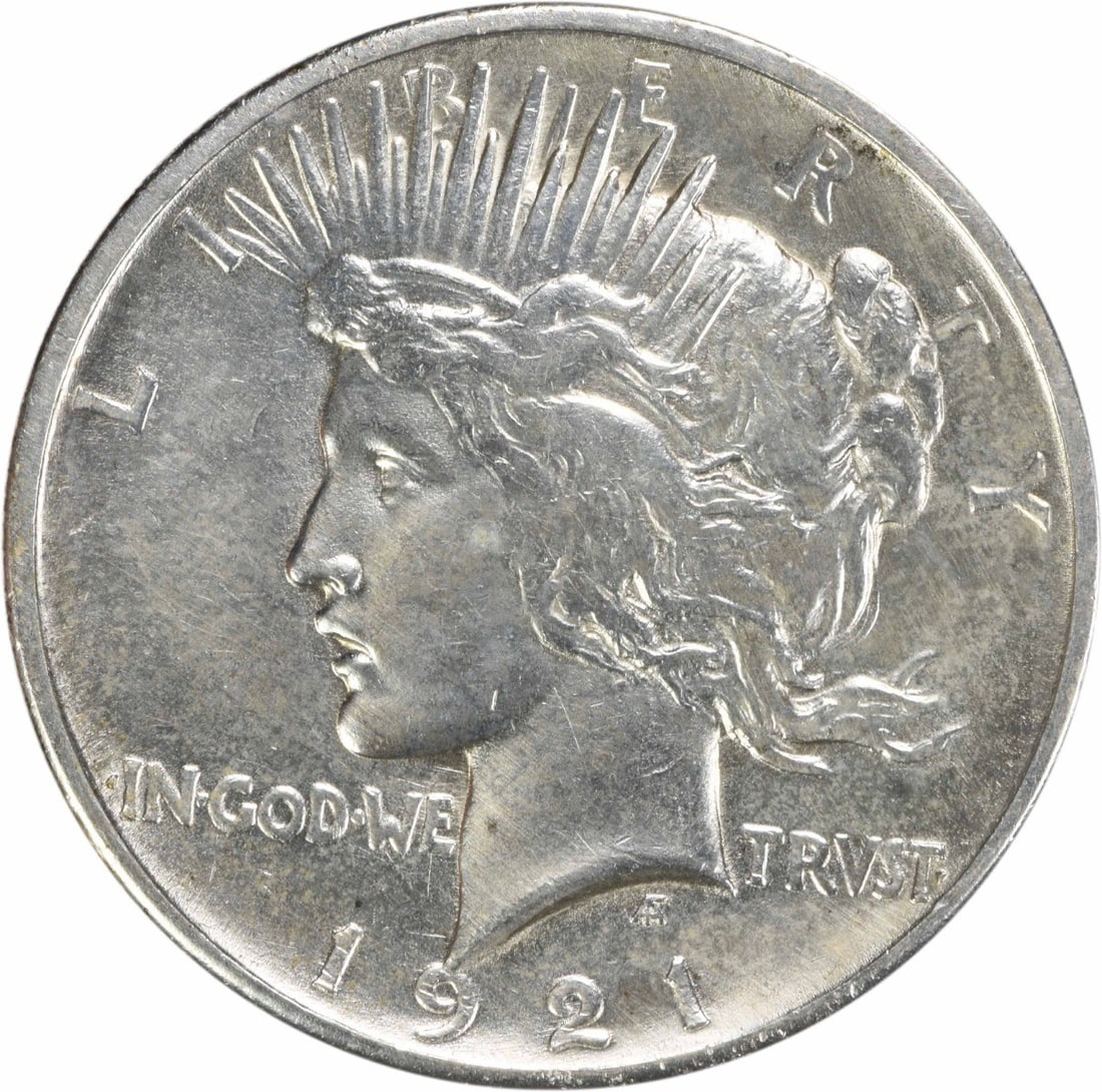 1921 Peace Silver Dollar EF Uncertified 90% Silver Coin: 1921 Peace Silver Dollar EF Uncertified 90% Silver Coin This 1921 Peace Silver Dollar is an exquisite piece of American history, featuring a design by Anthony de Francisci. The coin has a composition 