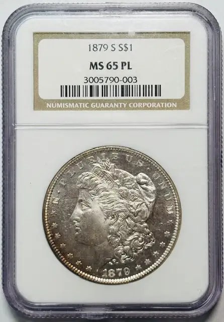 1879 S Morgan Silver Dollar NGC MS65 PL Uncirculated: 1879 S Morgan Silver Dollar NGC MS65 PL Uncirculated This stunning 1879 S Morgan Silver Dollar is certified by NGC, showcasing its exceptional MS 65 grade and Proof Like finish. Struck in silver at th