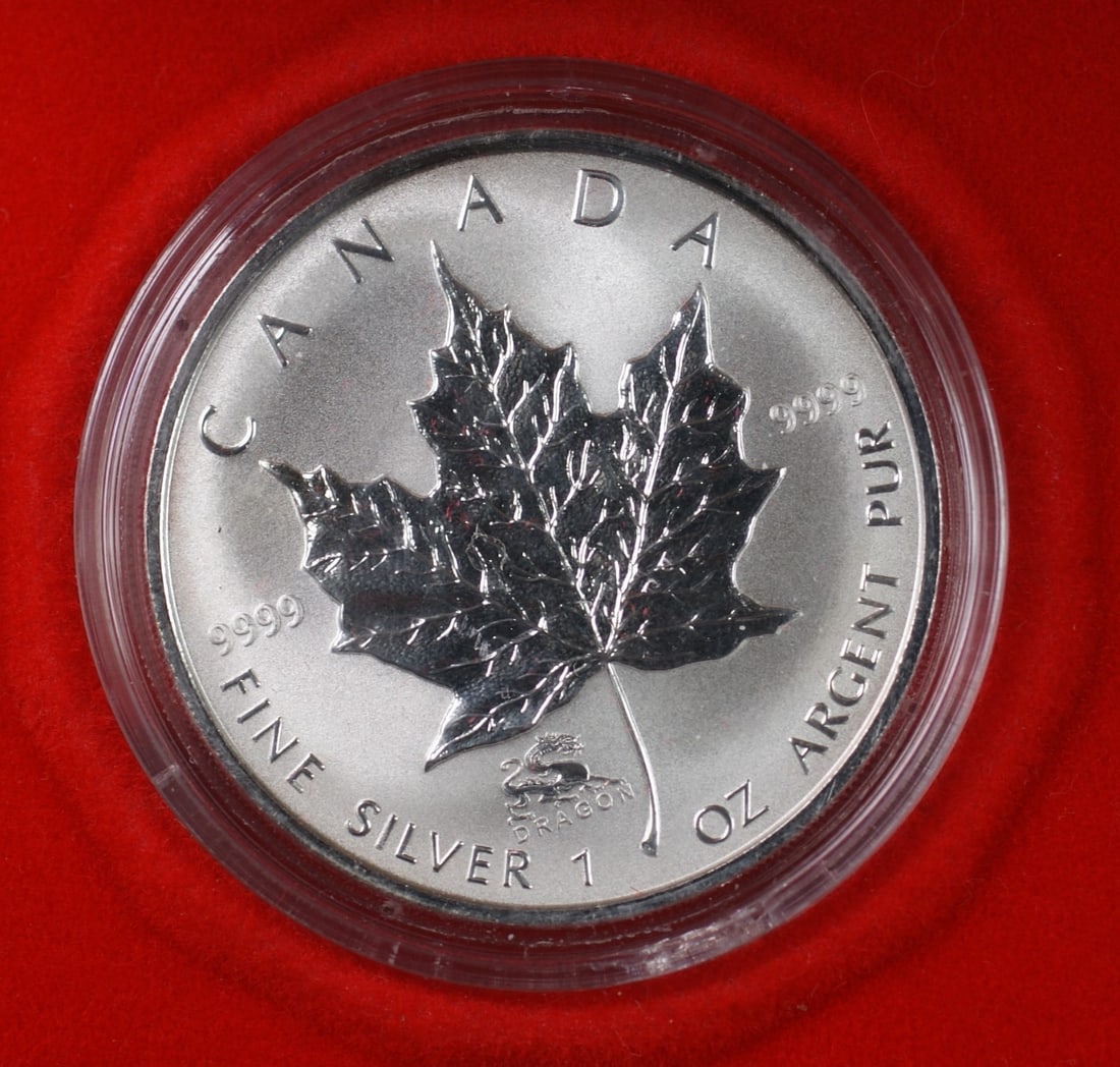2000 Canada $5 Silver Maple Leaf Dragon Coin with Box and COA: 2000 Canada $5 Silver Maple Leaf Dragon Coin with Box and COA This 2000 Canada $5 Silver Maple Leaf Dragon Coin is a stunning commemorative piece made from .9999 fine silver. It is uncirculated and fe