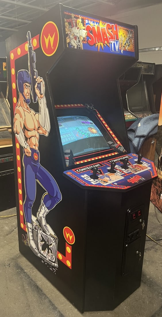 Williams Smash TV Arcade Machine 1990 Rare Vintage: Williams Smash TV Arcade Machine 1990 Rare Vintage This rare 1990 Smash TV arcade machine by Williams is a nostalgic piece of gaming history. It is in excellent condition, having been well maintained