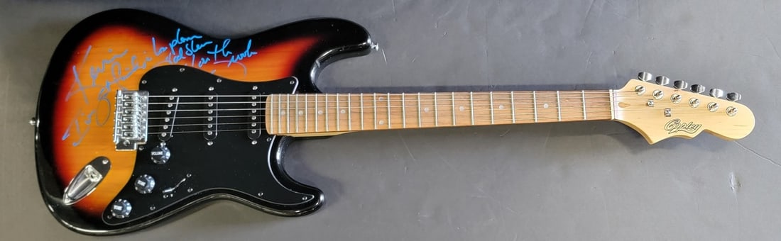 Garth Brooks Autographed Electric Guitar Beckett Authenticated: Garth Brooks Autographed Electric Guitar Beckett Authenticated This is an authentic electric guitar hand-signed by country music superstar Garth Brooks. The autograph has been verified by Beckett Auto