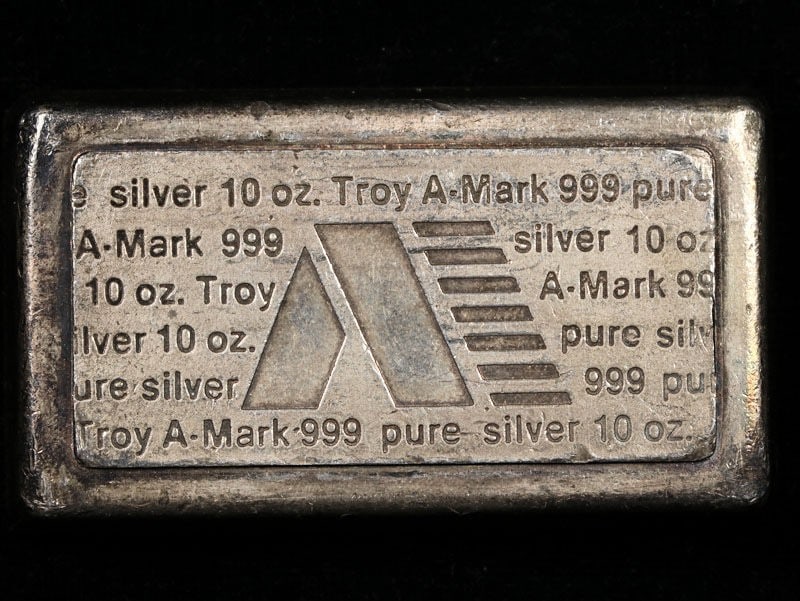 Vintage 10 Ounce .999 Fine Silver Bar A-Mark USVI Ingot: Vintage 10 Ounce .999 Fine Silver Bar A-Mark USVI Ingot This Vintage 10 Ounce Silver Bar features a design from the US Virgin Islands and is crafted from .999 fine silver. It is an excellent addition 