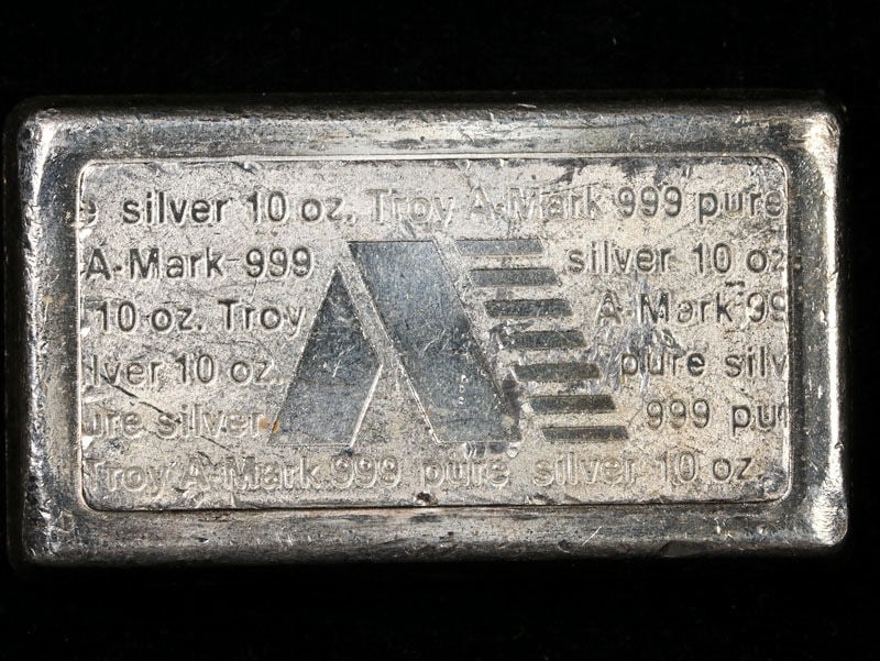 Vintage 10 Ounce Silver Bar USVI Ingot A-Mark Stacker .999: Vintage 10 Ounce Silver Bar USVI Ingot A-Mark Stacker .999 This Vintage 10 Ounce Silver Bar features the USVI Ingot design and is part of the A-Mark Stacker collection. Crafted with a high silver cont