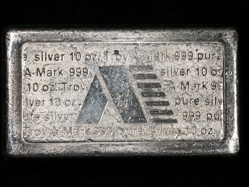 Vintage 10 Ounce .999 Silver Bar USVI Ingot A-Mark Stacker: Vintage 10 Ounce .999 Silver Bar USVI Ingot A-Mark Stacker This vintage 10-ounce silver bar features the USVI ingot design by A-Mark. Crafted from .999 fine silver, this bar is a remarkable addition f