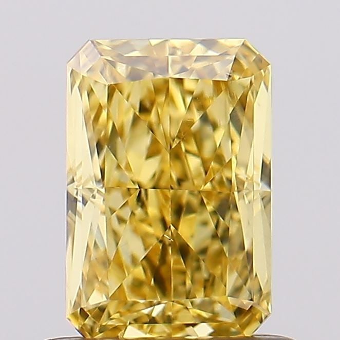 Loose Diamond - RADIANT 1.0ct Fancy Vivid Yellow VS2: Loose Diamond - RADIANT 1.0ct Fancy Vivid Yellow VS2 Source: This is a real non-mined Diamond that has been grown in a lab Shape: RADIANT Carats: 1.0 Color: Fancy Vivid Yellow Certification: IGI Video