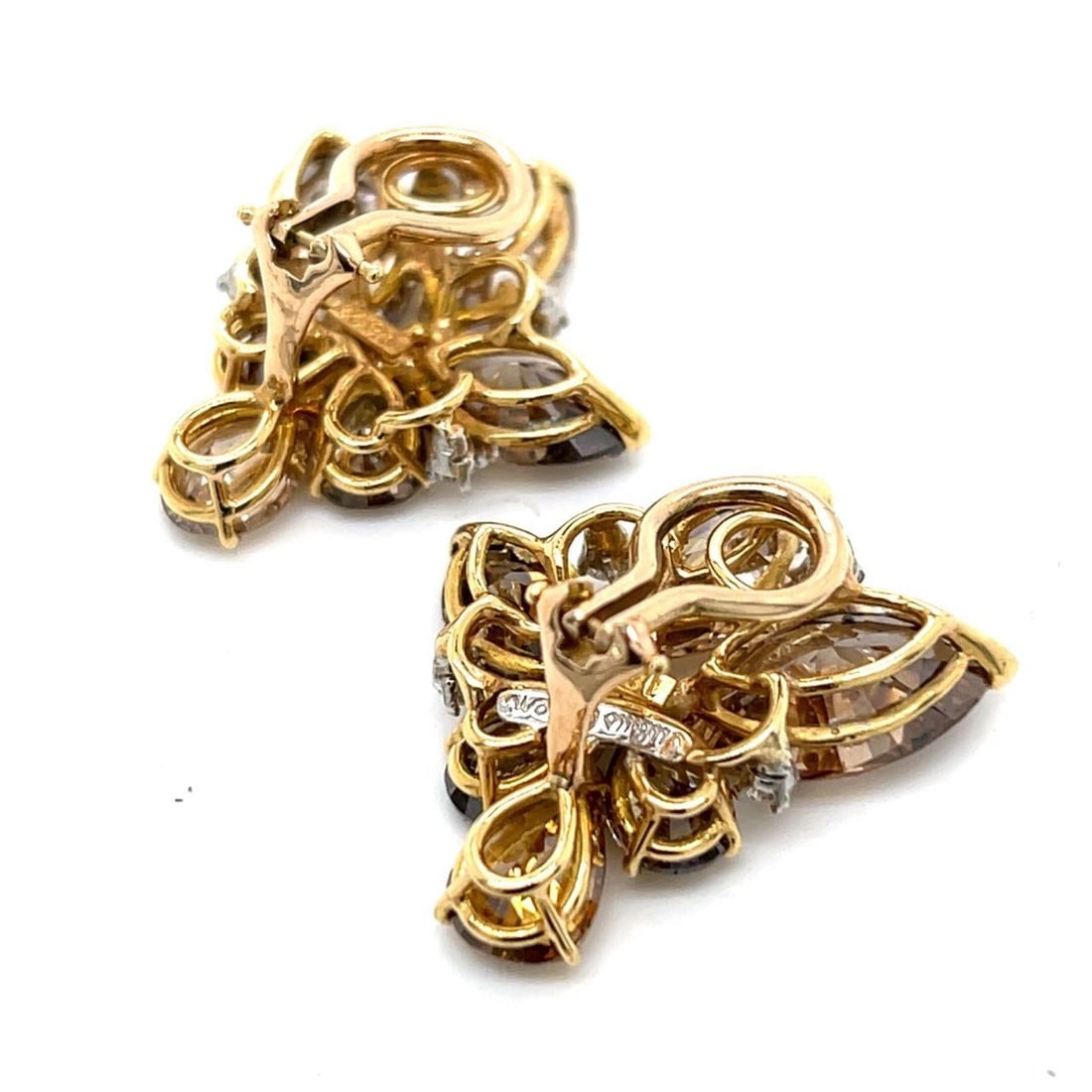 JULIUS COHEN 18K Yellow Gold Natural Color Diamond Earrings 14.50 Ct: JULIUS COHEN 18K Yellow Gold Natural Color Diamond Earrings 14.50 Ct These exquisite earrings feature 18K yellow gold and are adorned with 12 natural color diamonds showcasing a stunning fancy orange-