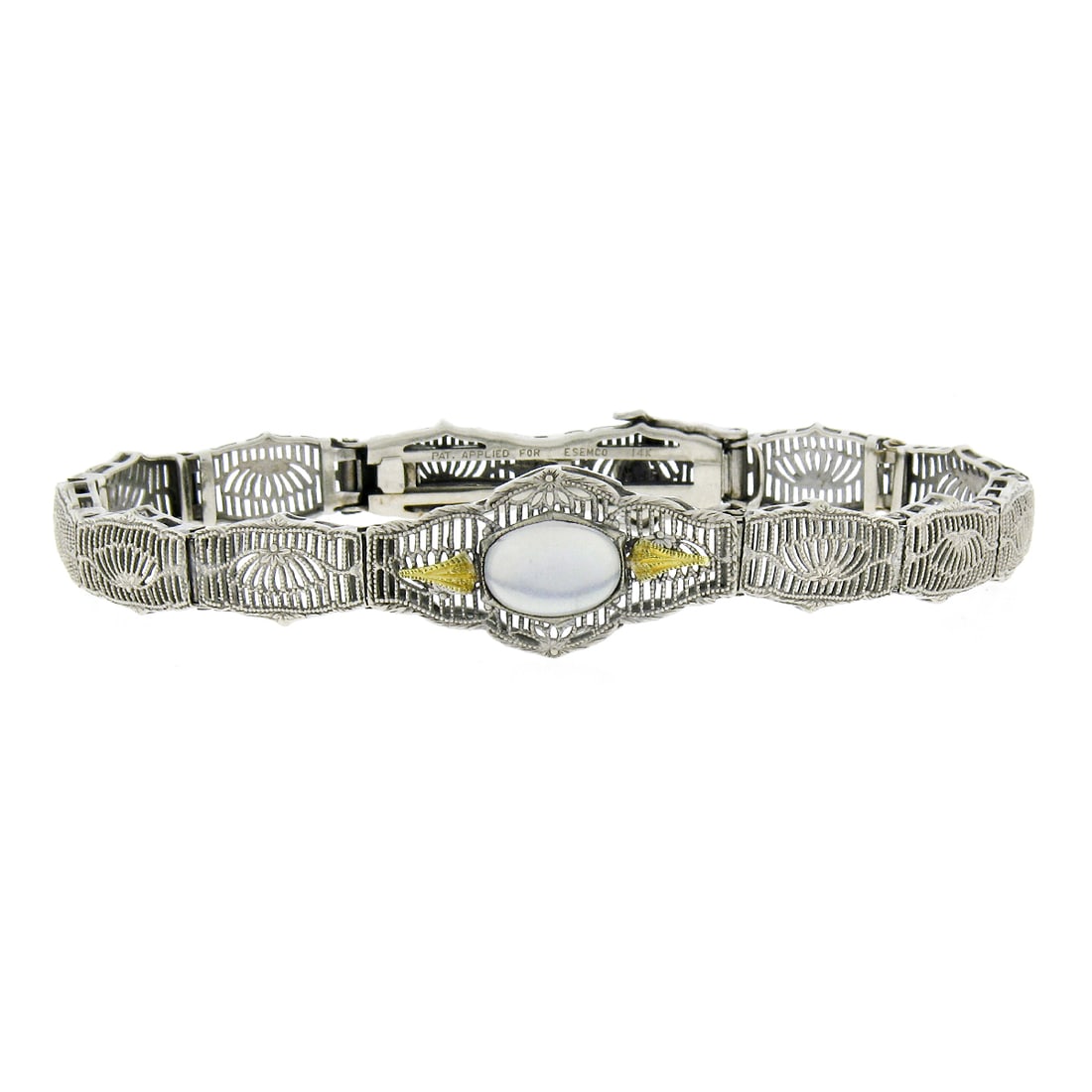 Antique Art Deco 14k Gold Filigree Moonstone Slide Bracelet: Antique Art Deco 14k Gold Filigree Moonstone Slide Bracelet Discover the elegance of this Antique Art Deco bracelet, featuring a stunning design crafted from solid 14k white and yellow gold. The brace