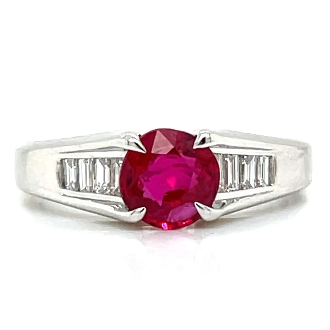 Platinum GIA Certified 1.08 Ct Ruby and 8 Baguette Diamond Ring: Platinum GIA Certified 1.08 Ct Ruby and 8 Baguette Diamond Ring This stunning platinum ring features a GIA Certified 1.08 Ct. heated ruby, beautifully complemented by 8 baguette diamonds totaling 0.23
