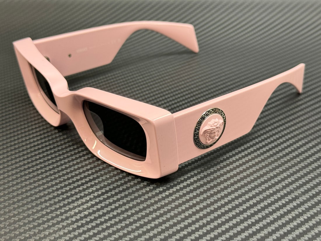 Versace VE4474U 548587 Pink Grey Women's Sunglasses with Authenticity Certificate: Versace VE4474U 548587 Pink Grey Women's Sunglasses with Authenticity Certificate Elevate your accessory collection with these stunning Versace VE4474U sunglasses. Featuring a vibrant pink frame and d