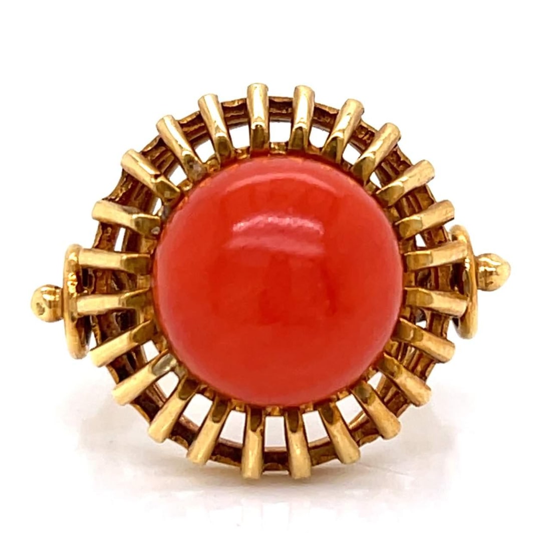 Vintage 1960's 18K Yellow Gold Coral Ring 12.4mm: Vintage 1960's 18K Yellow Gold Coral Ring 12.4mm This exquisite 1960's ring features a stunning 12.4mm coral stone elegantly set in 18K yellow gold. Weighing 8.5 grams, this piece is a beautiful repre