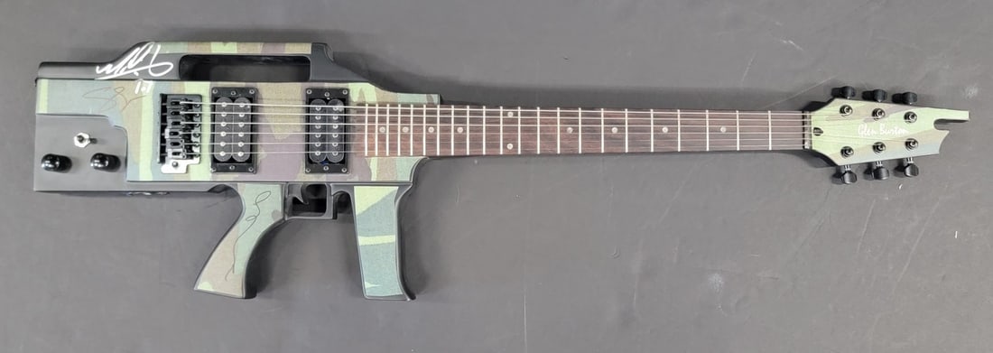 The Walking Dead Autographed Guitar by Steven Yeun JSA Certified: The Walking Dead Autographed Guitar by Steven Yeun JSA Certified This original autographed guitar features signatures from actors Sarah Wayne Callies and Steven Yeun, known for their roles in the popu