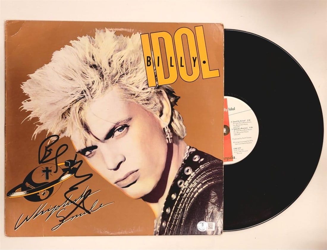Billy Idol Whiplash Smile Signed Vinyl Album Cover Beckett Authenticated: Billy Idol Whiplash Smile Signed Vinyl Album Cover Beckett Authenticated This is a pre-owned vinyl album cover of Billy Idol's "Whiplash Smile", featuring his authentic signature. The autograph is ver