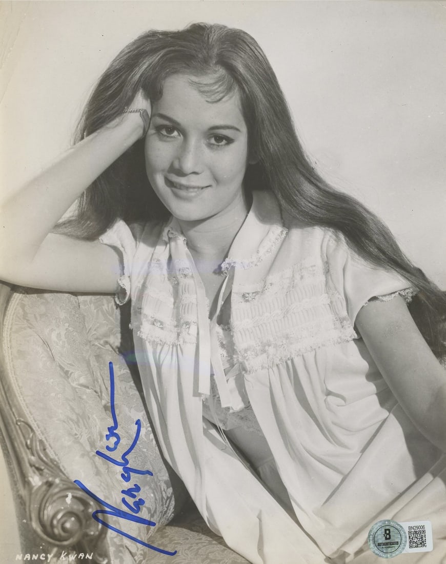 Nancy Kwan Signed 7x9 Photo Dragon Bruce Lee Story Beckett Authenticated: Nancy Kwan Signed 7x9 Photo Dragon Bruce Lee Story Beckett Authenticated This authentic 7x9 photograph features the signature of Nancy Kwan, known for her role in 'Dragon: The Bruce Lee Story.' The ph