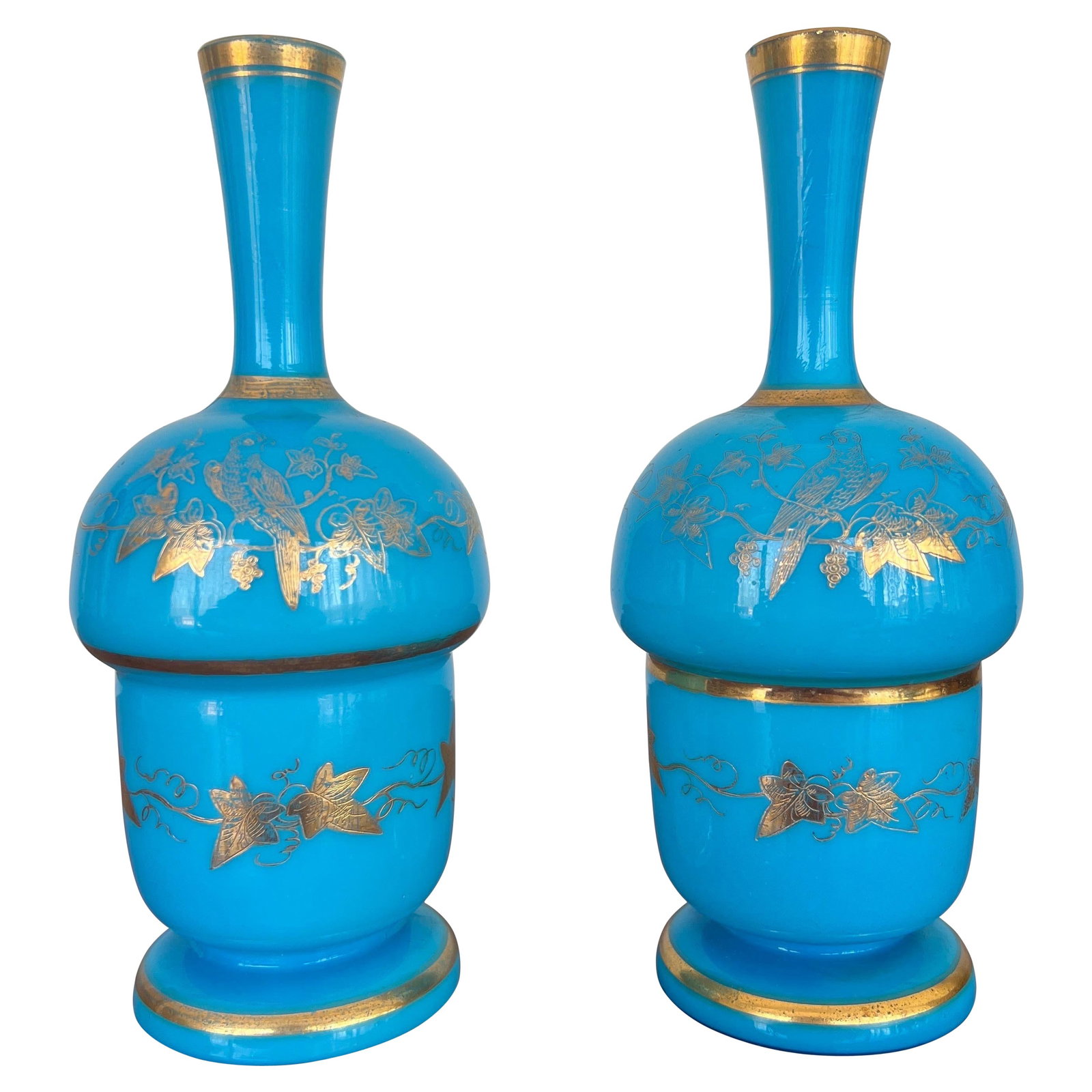 Set of 2 French Blue Opaline Vases with Gilt Decoration: Set of 2 French Blue Opaline Vases with Gilt Decoration This exquisite pair of French Opaline vases showcases a stunning blue hue adorned with intricate gilt decorations of foliate and vine motifs. Ma