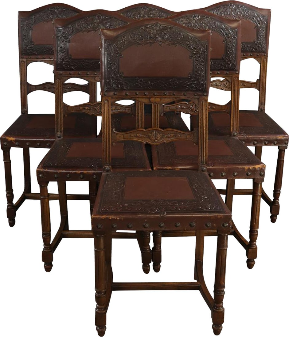 French Antique Henry II Dining Chairs with Embossed Leather Seats: French Antique Henry II Dining Chairs with Embossed Leather Seats Discover the charm of these French Antique Henry II Dining Chairs, crafted with exquisite embossed leather seats and sturdy walnut fra