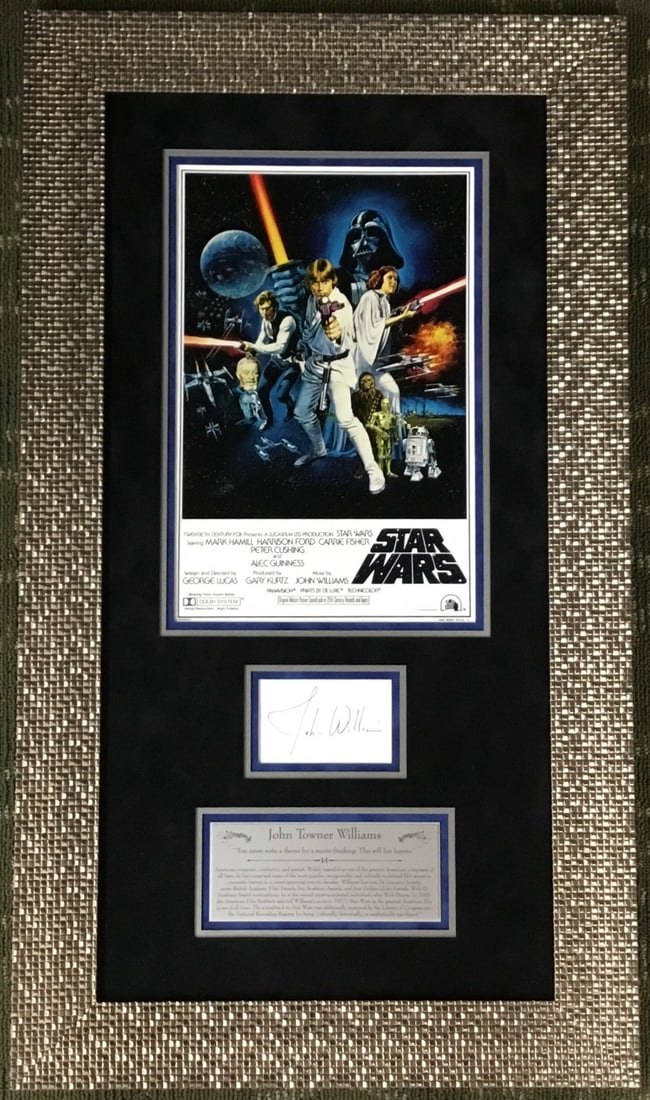 John Williams Signed Star Wars Custom Framed Display with JSA LOA: John Williams Signed Star Wars Custom Framed Display with JSA LOA This stunning custom-framed display features a hand-signed cut by the legendary composer John Williams, known for his iconic work on t