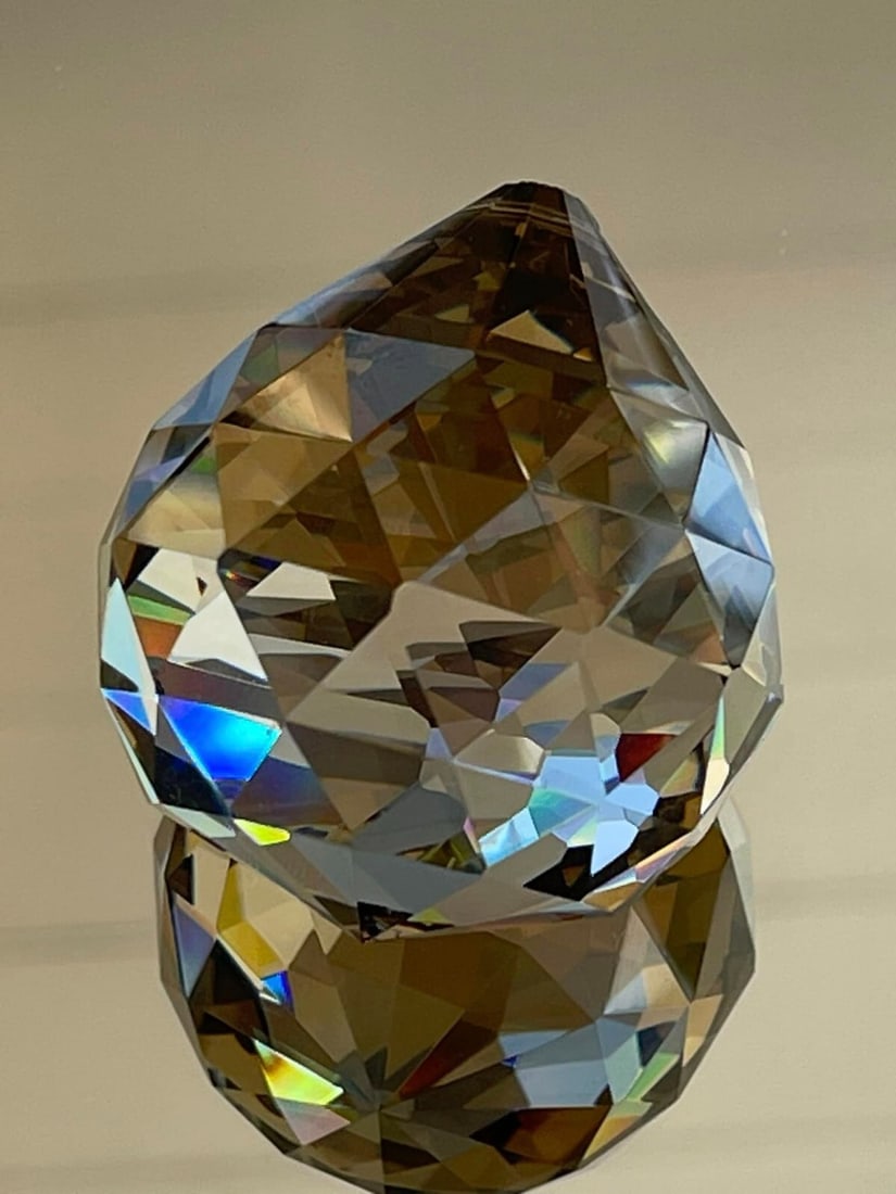 Asfour 40mm Smokey Crystal Chandelier Ball Suncatcher Decoration: Asfour 40mm Smokey Crystal Chandelier Ball Suncatcher Decoration Enhance your decor with this exquisite 40mm Asfour crystal ball suncatcher, featuring a stunning honey/smokey finish. Crafted from high