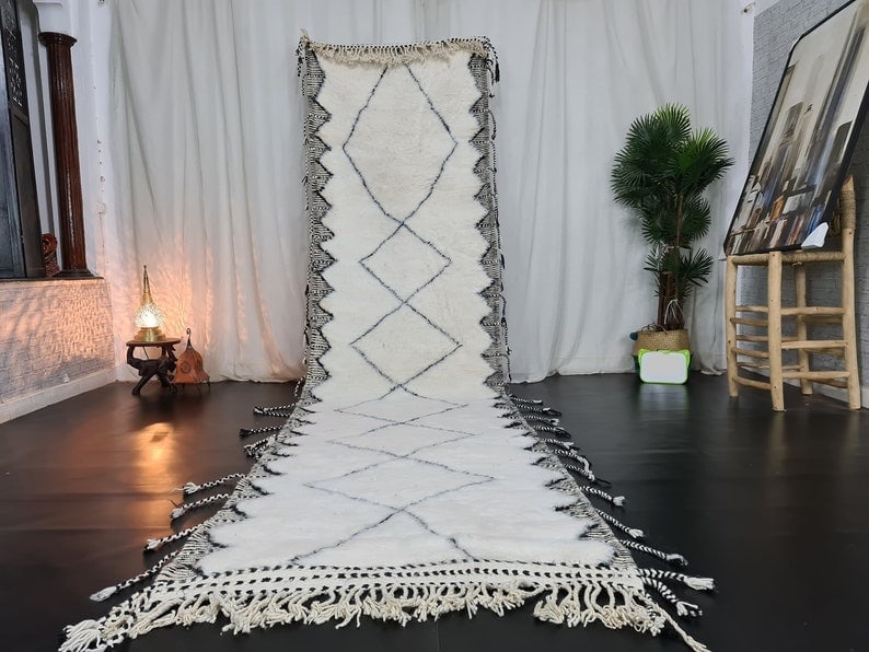 Authentic Handmade Moroccan Runner Rug 2 x 13 Feet: Authentic Handmade Moroccan Runner Rug 2 x 13 Feet Enhance your living space with this Stylish Authentic Soft Handmade Runner Rug. Featuring a striking black pattern and beautifully engraved frame, th
