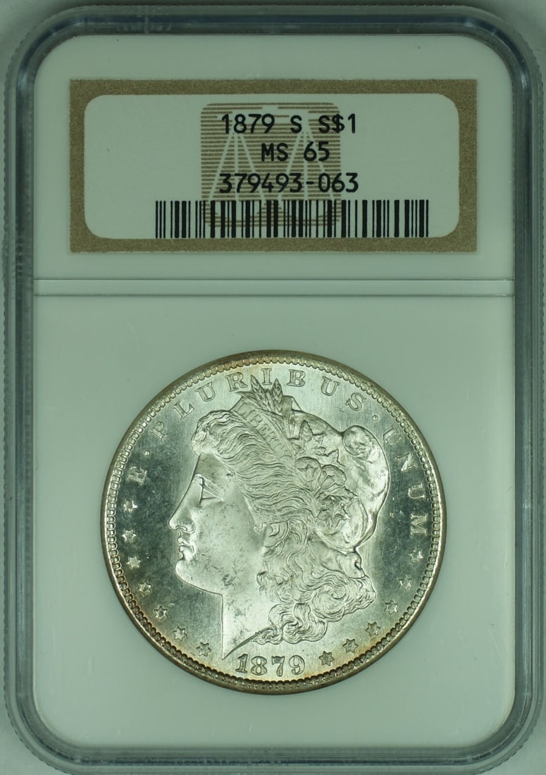 1879-S Morgan Silver Dollar NGC MS 65 Uncirculated Coin: 1879-S Morgan Silver Dollar NGC MS 65 Uncirculated Coin This stunning 1879-S Morgan Silver Dollar is a remarkable piece of numismatic history, showcasing the iconic Morgan design. Graded MS 65 by NGC,