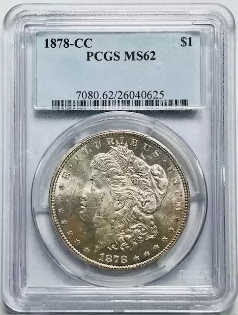 1878 CC Morgan Silver Dollar PCGS MS62 Uncirculated Carson City Coin: 1878 CC Morgan Silver Dollar PCGS MS62 Uncirculated Carson City Coin This 1878 CC Morgan Silver Dollar is a remarkable piece certified by PCGS with a grade of MS 62, indicating its uncirculated condit