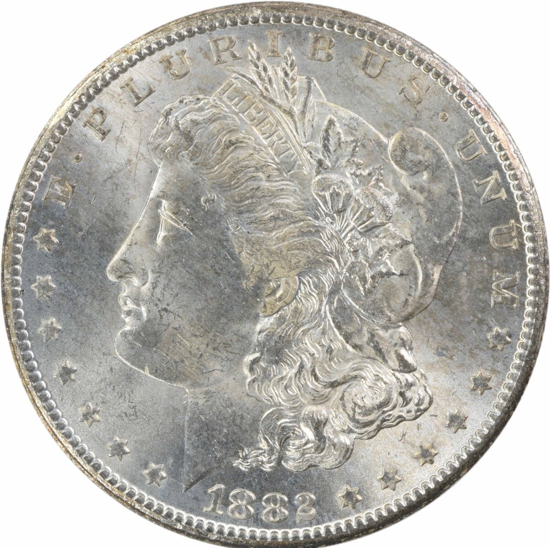 1882-CC Morgan Silver Dollar BU Uncertified Coin: 1882-CC Morgan Silver Dollar BU Uncertified Coin This 1882-CC Morgan Silver Dollar is a magnificent example of this iconic coin, showcasing its uncirculated condition with a brilliant uncirculated (BU