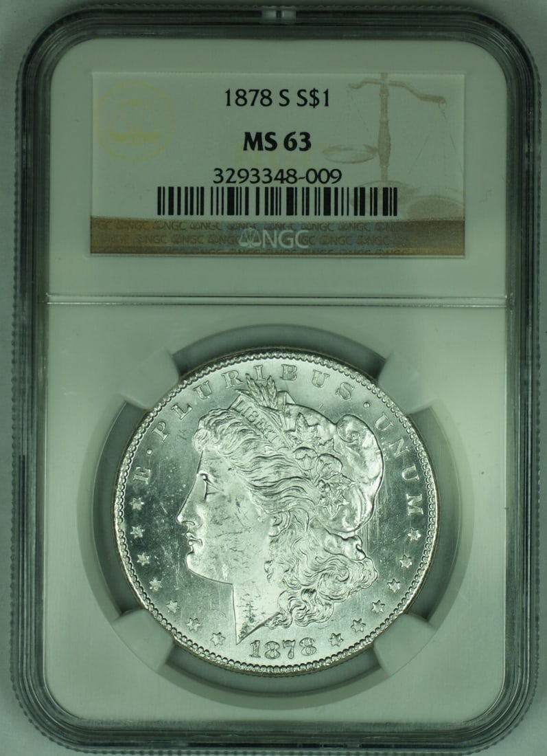 1878-S Morgan Silver Dollar NGC MS 63 Uncirculated Coin: 1878-S Morgan Silver Dollar NGC MS 63 Uncirculated Coin This 1878-S Morgan Silver Dollar is a stunning piece of American history, featuring a denomination of $1. Struck from pure silver, this coin is 