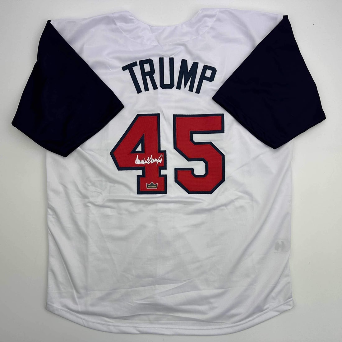 Donald Trump Autographed White Jersey Men's XL JSA Authenticated: Donald Trump Autographed White Jersey Men's XL JSA Authenticated This is an original facsimile autographed white jersey representing Donald Trump, the 45th President of the United States. This men's X
