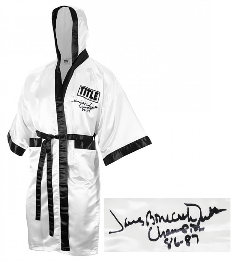 James Smith Signed Title Boxing Robe with Bonecrusher Champ Inscription: James Smith Signed Title Boxing Robe with Bonecrusher Champ Inscription This is an original James Smith signed Title white full-length boxing robe, featuring the inscriptions 'Bonecrusher, Champ 86-87
