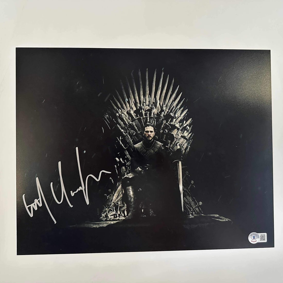 Signed Kit Harrington Jon Snow 11x14 Photo Beckett COA: Signed Kit Harrington Jon Snow 11x14 Photo Beckett COA Capture a piece of television history with this autographed 11x14 photo of Kit Harrington as Jon Snow on the Iron Throne. This original photo is