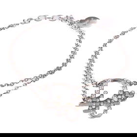 Dior CD Silver Metal Bracelet Made in France: Dior CD Silver Metal Bracelet Made in France This exquisite Christian Dior bracelet showcases a sleek silver tone, embodying the elegance and sophistication synonymous with the Dior brand. Crafted in