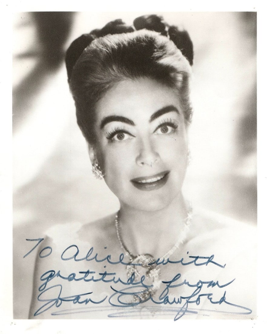 Joan Crawford Autographed Vintage 8x10 Photo Beckett Authenticated: Joan Crawford Autographed Vintage 8x10 Photo Beckett Authenticated This vintage 8x10 photograph features the legendary Joan Crawford, beautifully signed by the iconic actress herself. The autograph ha