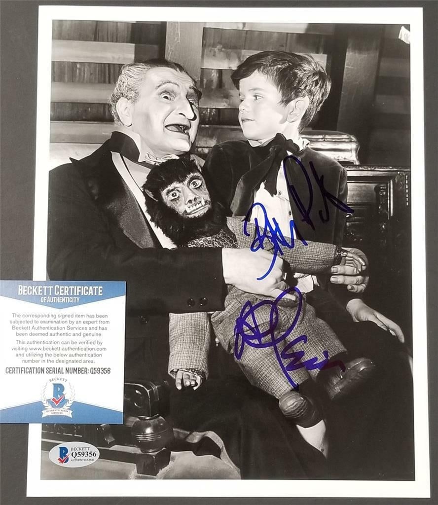 Al Lewis Butch Patrick Signed 8x10 Photo Munsters Beckett COA: Al Lewis Butch Patrick Signed 8x10 Photo Munsters Beckett COA This is an 8x10 photo featuring Al Lewis, known as "Grandpa," and Butch Patrick, recognized as "Eddie" from the classic television series