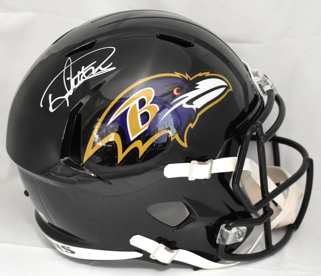 Derrick Henry Signed Baltimore Ravens Full Size Helmet Beckett Authenticated: Derrick Henry Signed Baltimore Ravens Full Size Helmet Beckett Authenticated This authentic Baltimore Ravens full-size speed helmet is autographed by NFL superstar Derrick Henry. It is a remarkable co