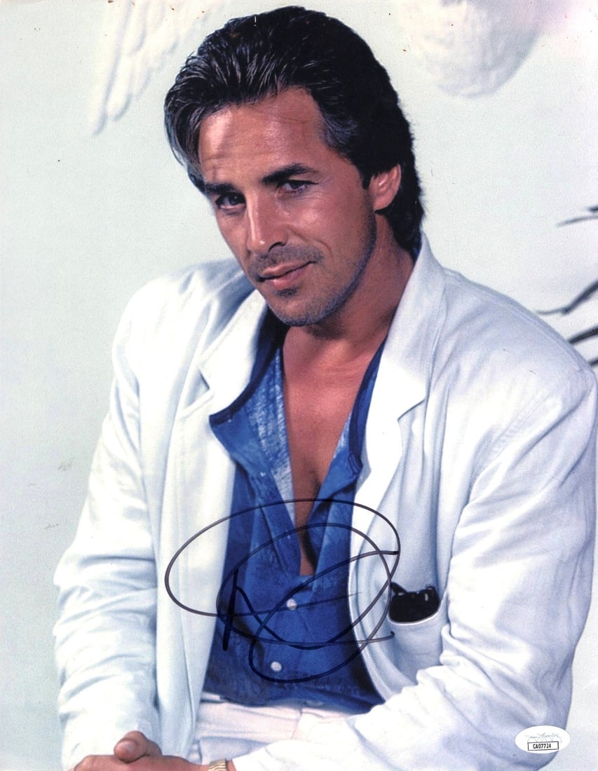 Don Johnson Autographed 11X14 Miami Vice Photo JSA Certified: Don Johnson Autographed 11X14 Miami Vice Photo JSA Certified This is an original signed photograph of Don Johnson, renowned for his role as James Crockett in the iconic television series Miami Vice. T