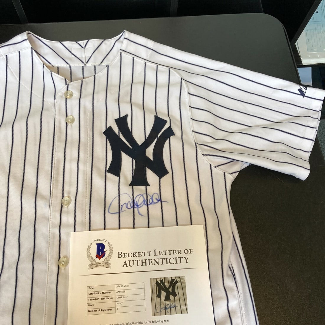 Derek Jeter Signed Yankees Majestic Jersey with Beckett COA: Derek Jeter Signed Yankees Majestic Jersey with Beckett COA Celebrate the legacy of baseball legend Derek Jeter with this authentic New York Yankees jersey. This Majestic jersey features Jeter's signa