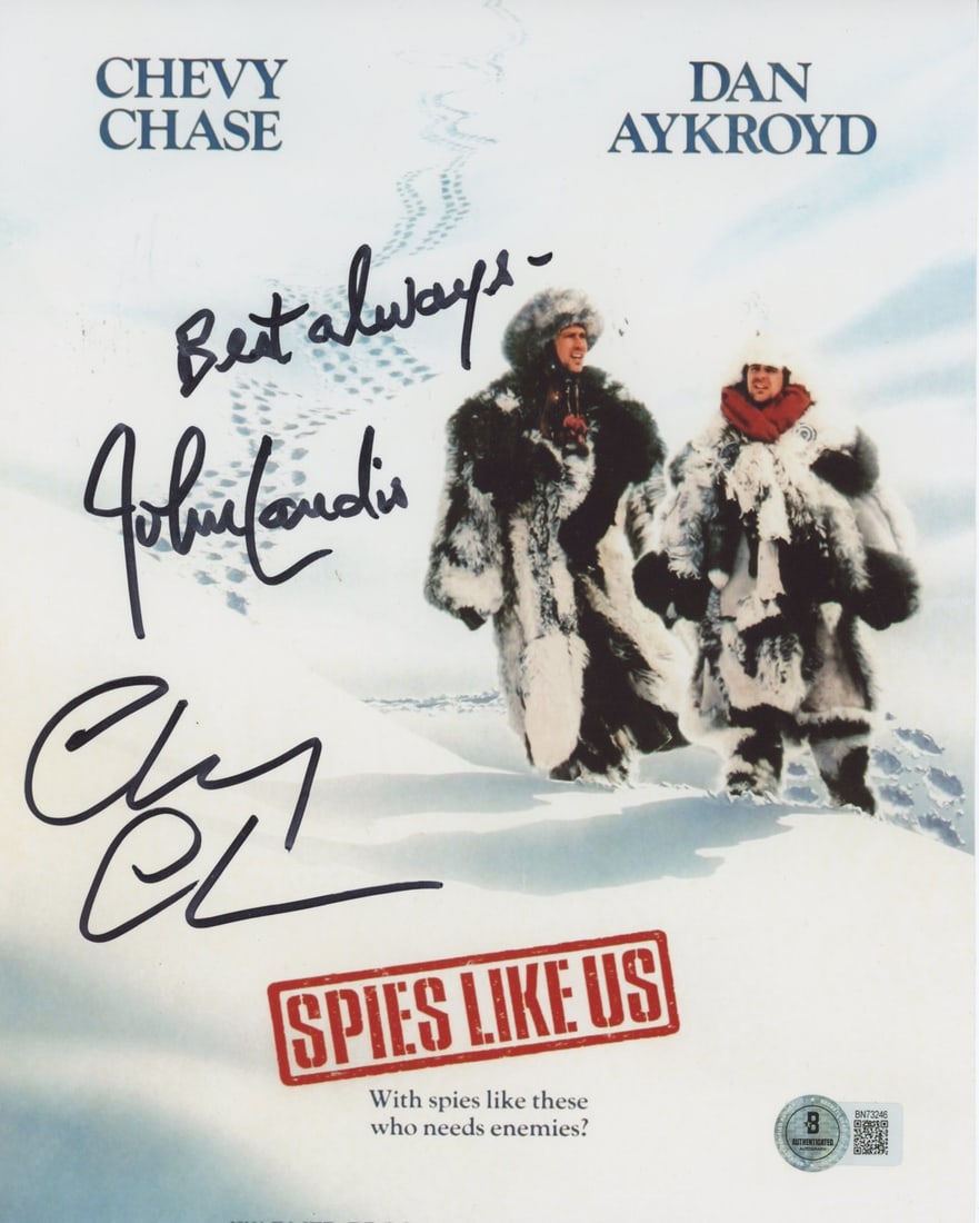 Chevy Chase John Landis Signed 8x10 Spies Like Us Photo BAS: Chevy Chase John Landis Signed 8x10 Spies Like Us Photo BAS This authentic 8x10 photograph features the signatures of Chevy Chase and John Landis, both known for their roles in the classic film "Spies