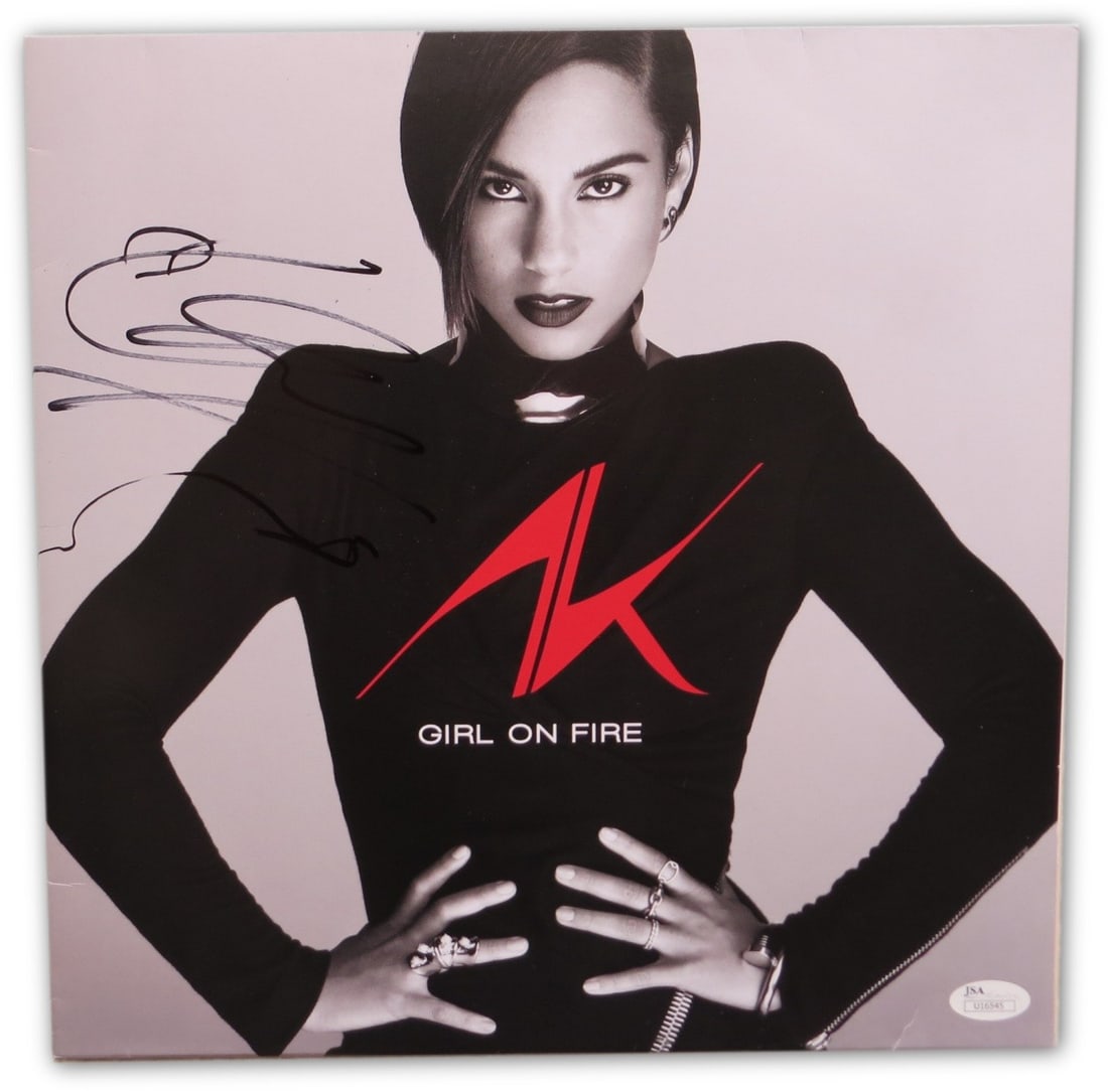 Alicia Keys Autographed Album Cover Girl on Fire JSA Certified: Alicia Keys Autographed Album Cover Girl on Fire JSA Certified Own a piece of music history with this Alicia Keys signed album cover for 'Girl on Fire.' This original album cover is authenticated by J