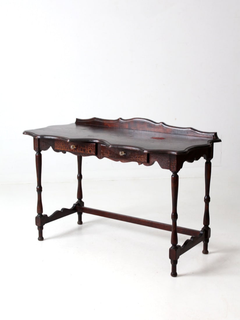 Turn-of-the-Century Antique Console Table with Dark Patina and Two Drawers: Turn-of-the-Century Antique Console Table with Dark Patina and Two Drawers This exquisite American turn-of-the-century antique console table showcases a beautiful dark patina and elegant curves, highl