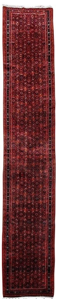 Handmade Persian Runner Rug 9.8 x 17.5 Dark Red Intricate Designs: Handmade Persian Runner Rug 9.8 x 17.5 Dark Red Intricate Designs Elevate your space with this exquisite handmade Persian runner rug, measuring 9' 8" x 17' 5". Crafted by skilled artisans in Iran, thi