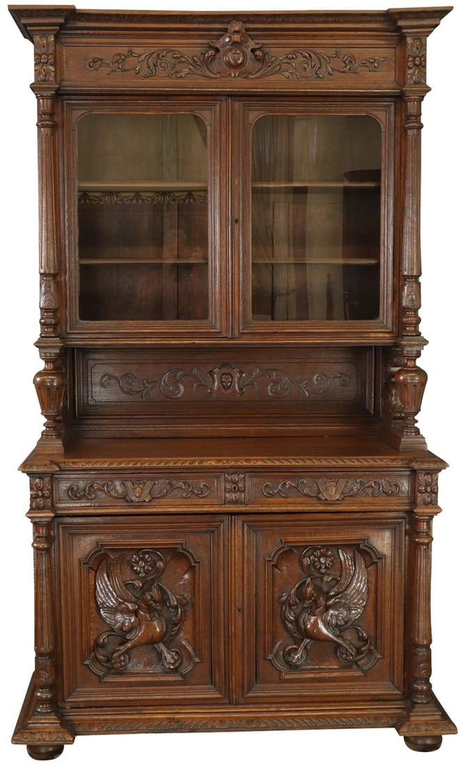 1880 French Renaissance Oak Buffet with Majestic Carvings: 1880 French Renaissance Oak Buffet with Majestic Carvings This exquisite French Renaissance oak buffet showcases majestic carvings that embody the craftsmanship of the 1880s. Designed in a Hunting Sty