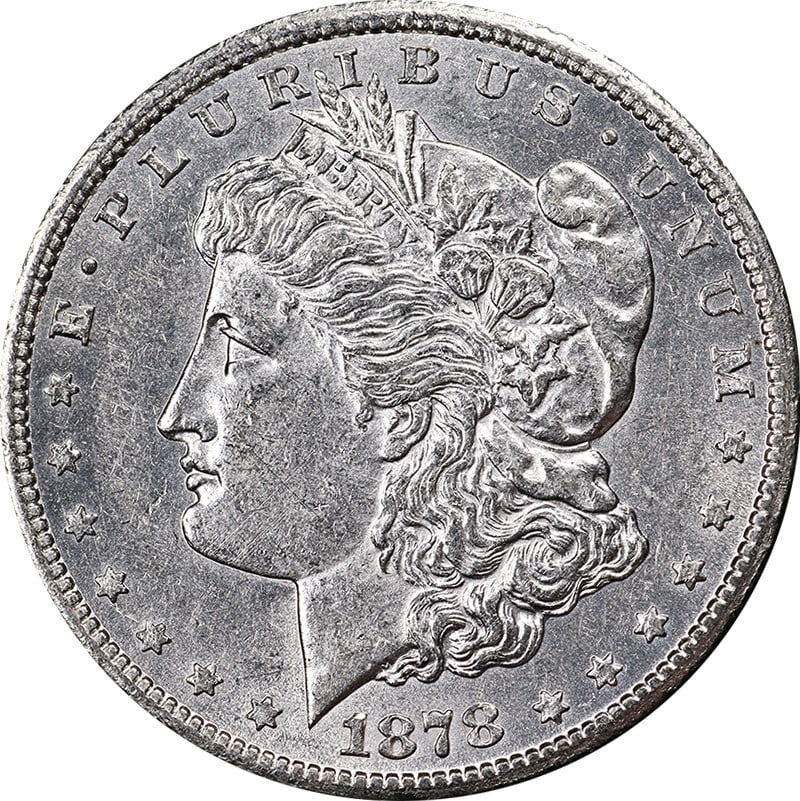 1878-CC Morgan Silver Dollar Choice AU/BU Strong Strike Silver Coin: 1878-CC Morgan Silver Dollar Choice AU/BU Strong Strike Silver Coin This 1878-CC Morgan Silver Dollar showcases a beautiful eye appeal with a strong strike, making it an appealing addition for any coi