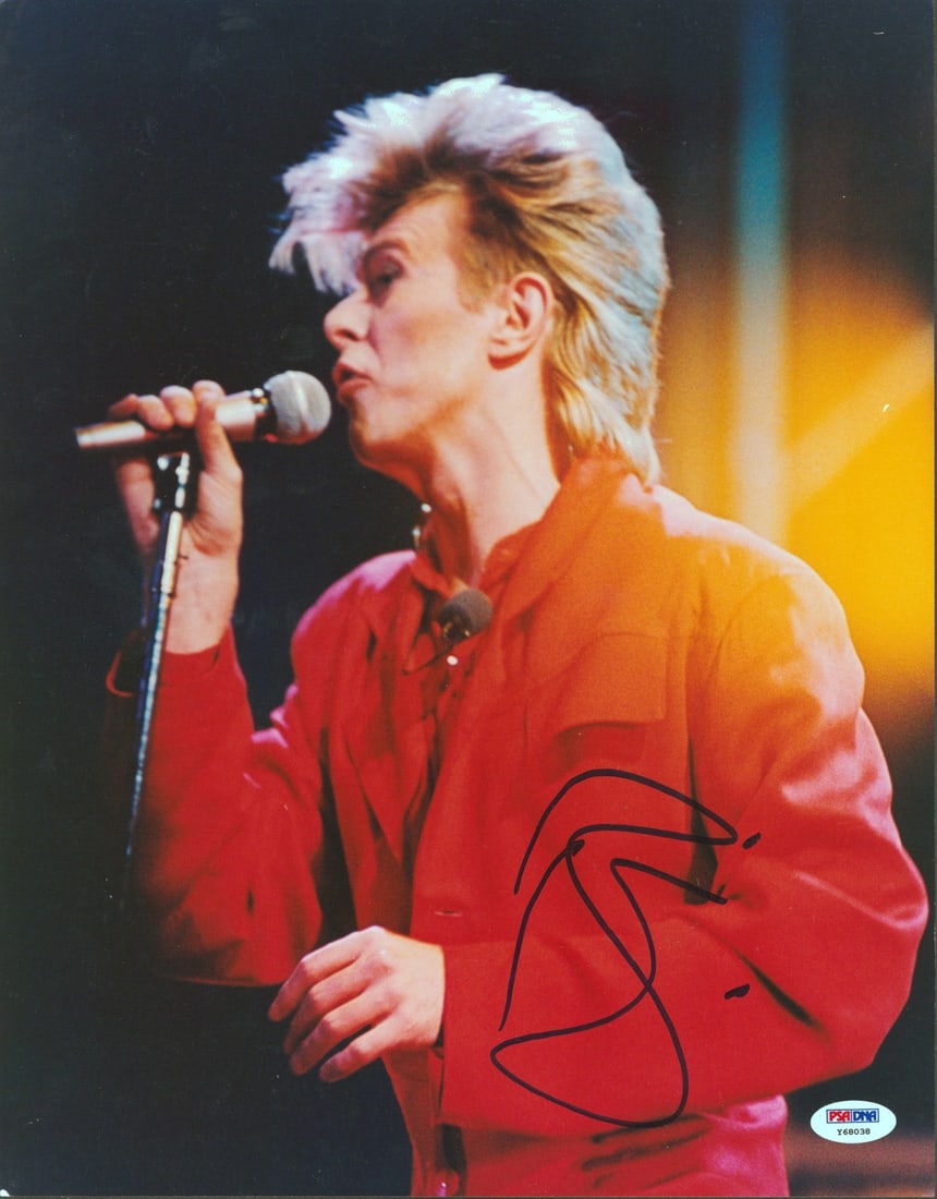 David Bowie Signed 11x14 Photo PSA/DNA Certified Authentic: David Bowie Signed 11x14 Photo PSA/DNA Certified Authentic This stunning 11x14 photograph of David Bowie has been personally signed by the legendary artist himself. The item is certified authentic by