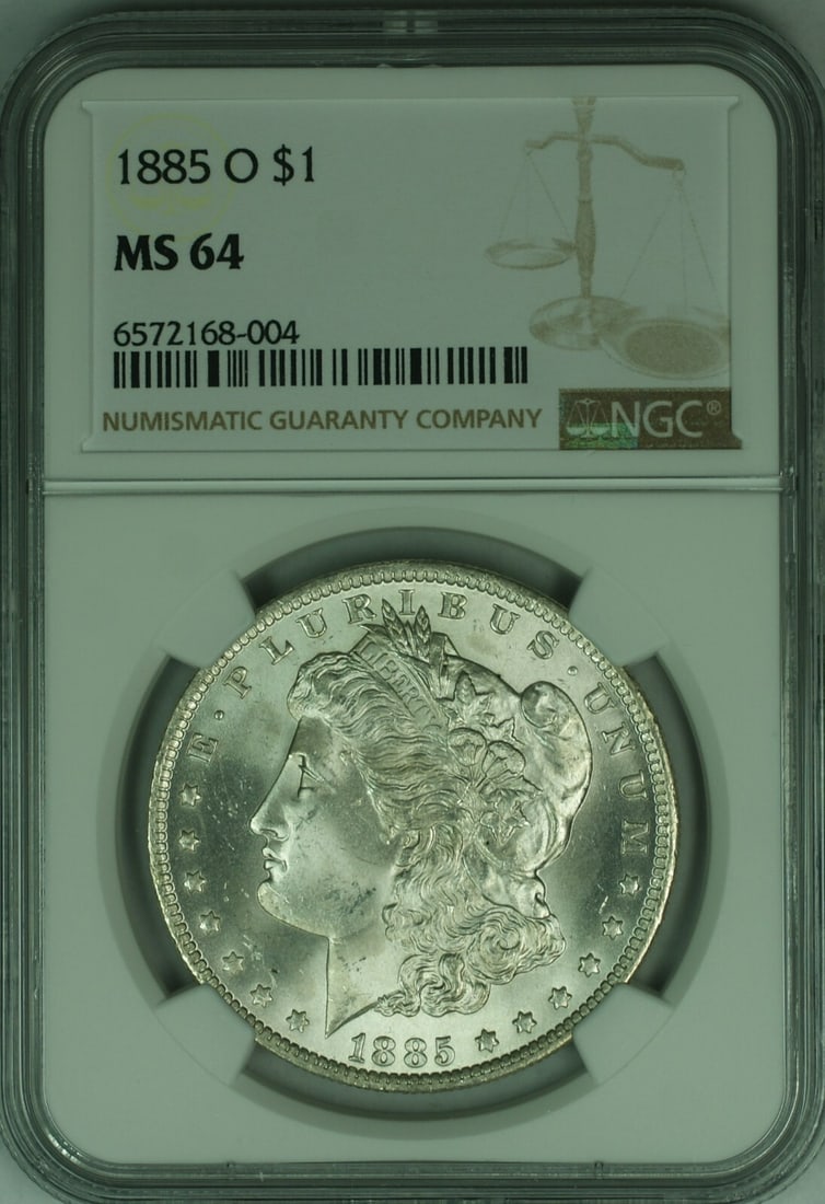 1885-O Morgan Silver Dollar NGC MS 64 Uncirculated Coin: 1885-O Morgan Silver Dollar NGC MS 64 Uncirculated Coin This 1885-O Morgan Silver Dollar is a stunning example of American coinage. Graded MS-64 by NGC, this uncirculated coin showcases the intricate 