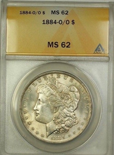 1884-O/O Morgan Silver Dollar ANACS MS-62 Uncirculated Coin: 1884-O/O Morgan Silver Dollar ANACS MS-62 Uncirculated Coin Discover this stunning 1884-O/O Over Mint Mark Morgan Silver Dollar, a rare find for coin collectors. Certified by ANACS with a grade of MS