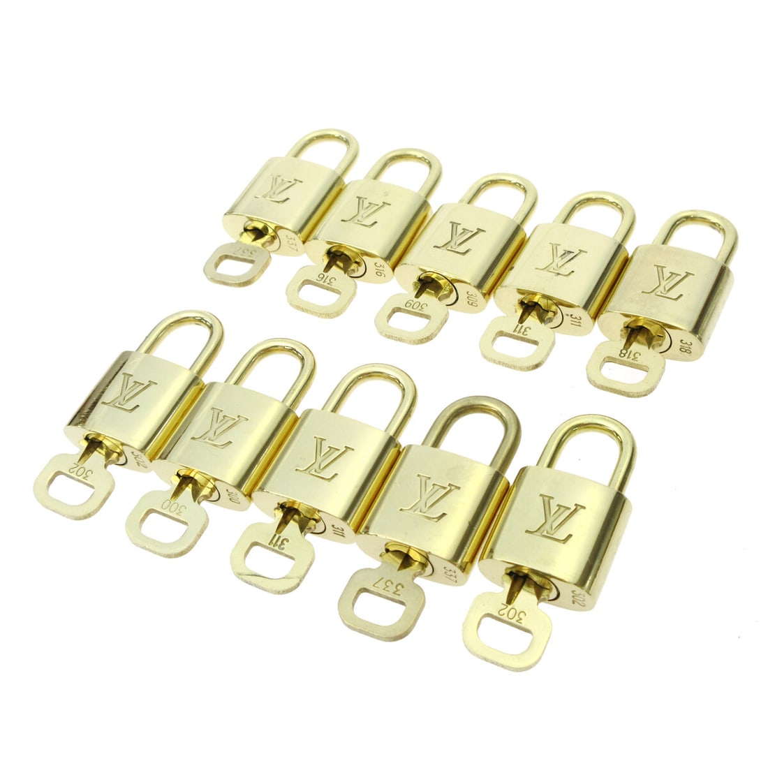 Louis Vuitton Gold Padlock & Key Accessories 10 Piece Set: Louis Vuitton Gold Padlock & Key Accessories 10 Piece Set Enhance your Louis Vuitton collection with this exquisite 10-piece set of Padlock & Key Bag Accessories. Crafted in a luxurious gold tone, the