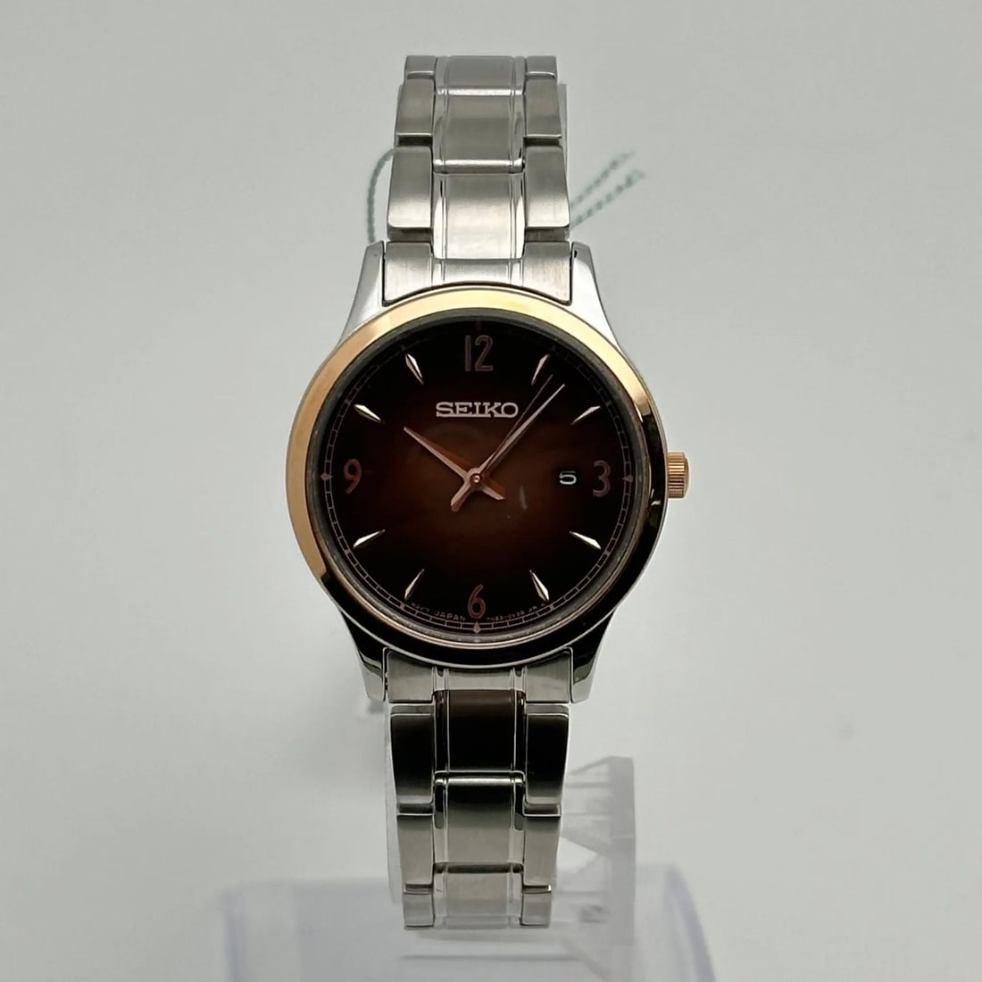 Seiko Ladies Quartz Watch 29mm Brown Dial Stainless Steel 7N82-0JN0: Seiko Ladies Quartz Watch 29mm Brown Dial Stainless Steel 7N82-0JN0 Discover elegance and functionality with this Seiko Ladies Quartz Watch, featuring a sophisticated 29mm round case with a polished s