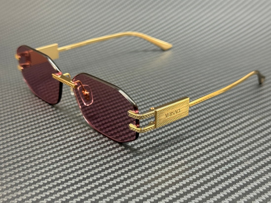 Versace VE2274 100284 Women's Gold Pink Sunglasses: Versace VE2274 100284 Women's Gold Pink Sunglasses Elevate your style with these stunning Versace VE2274 100284 sunglasses, designed for the modern woman. Featuring a luxurious gold frame complemented