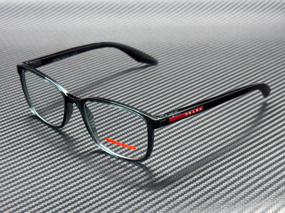 Prada Linea Rossa PS 07RV CZH1O1 Transparent Azure Eyeglasses with Demo Lenses: Prada Linea Rossa PS 07RV CZH1O1 Transparent Azure Eyeglasses with Demo Lenses Stylishly designed Prada Linea Rossa PS 07RV CZH1O1 eyeglasses feature a sleek transparent azure frame that exudes modern